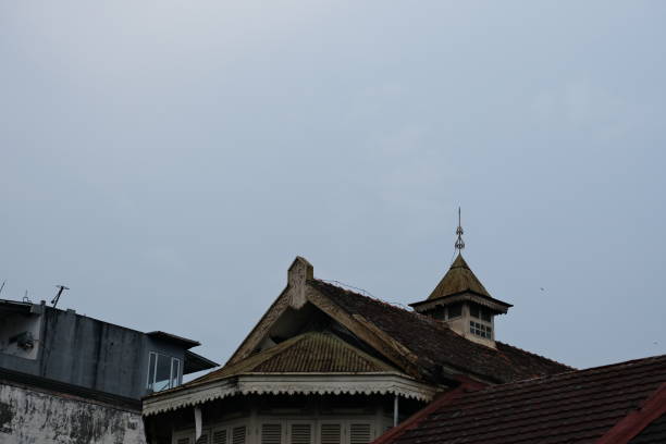 istock Dormer window on vintage house, viewed from below 1397859863