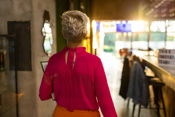 istock Rear-view of unrecognizable Caucasian businesswoman 1397862607