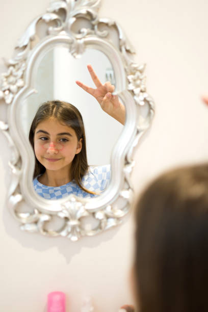 istock Beautiful girl fixing make up 1397863625