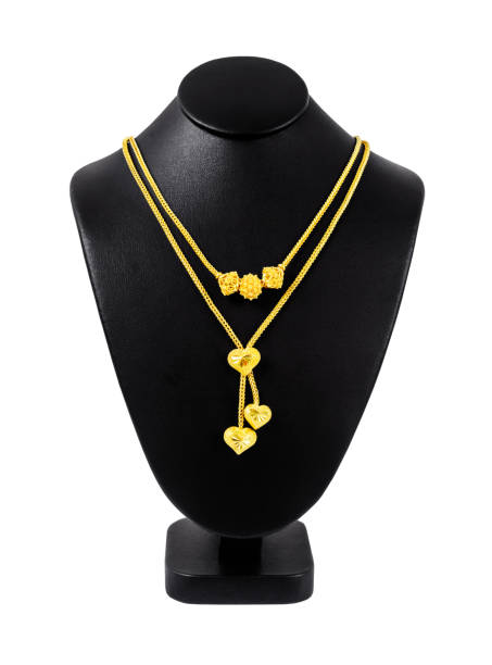 istock Gold necklace on necklace display stand isolated on white background, Save Clipping path. 1397863635