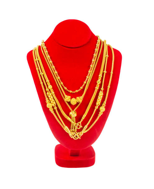 istock Gold necklace on necklace display stand isolated on white background, Save Clipping path. 1397863653