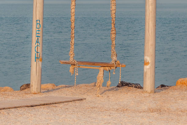 istock Beach swing at seaside coast in summer morning 1397863667