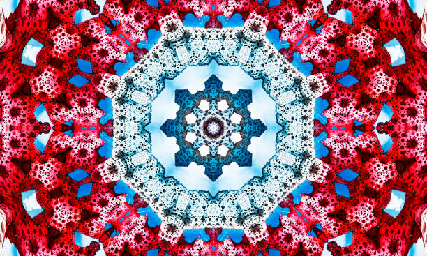 Snowflakes on blue sky background, christmas knitting seamless pattern with snowflakes. Knitted red sweater design. Traditional knitted ornamental pattern.