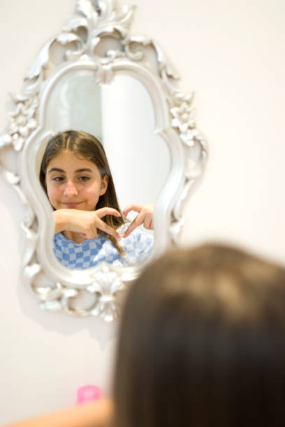 istock Beautiful girl fixing make up 1397866858