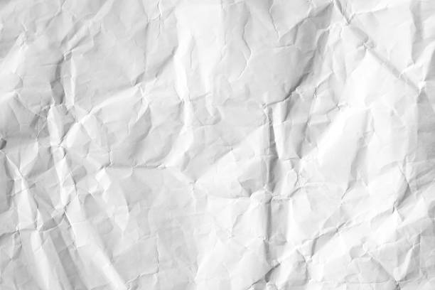 istock White wrinkled recycle paper texture background 1397866954