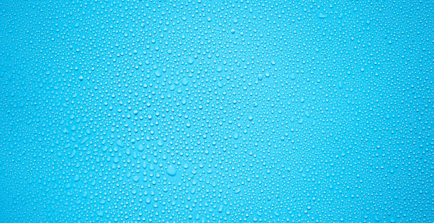 istock Water drops or rain drops on blue plastic sheet background 1397867127