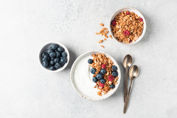 istock Greek yogurt bowl with granola and berries 1397869052