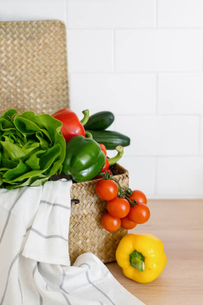 istock Fresh vegetables in wicker basket in kitchen 1397870478