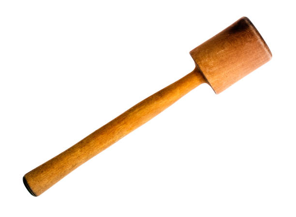 istock Old, vintage wooden pestle on white background. 1397872121