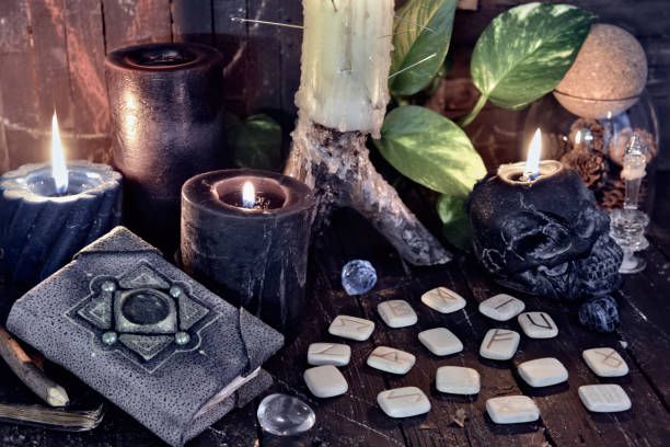 istock Wicca, esoteric and occult still life with vintage magic objects on witch table altar for mystic rituals and fortune telling. Halloween and gothic concept 1397873307