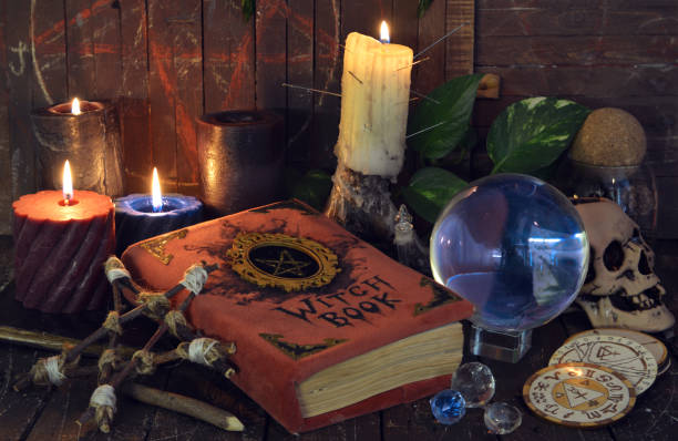 istock Wicca, esoteric and occult still life with vintage magic objects on witch table altar for mystic rituals and fortune telling. Halloween and gothic concept 1397873444