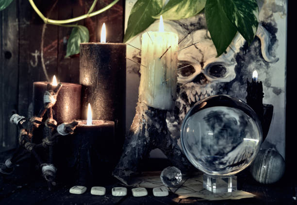 istock Wicca, esoteric and occult still life with vintage magic objects on witch table altar for mystic rituals and fortune telling. Halloween and gothic concept 1397873589