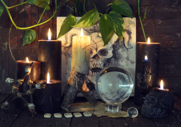 istock Wicca, esoteric and occult still life with vintage magic objects on witch table altar for mystic rituals and fortune telling. Halloween and gothic concept 1397873621