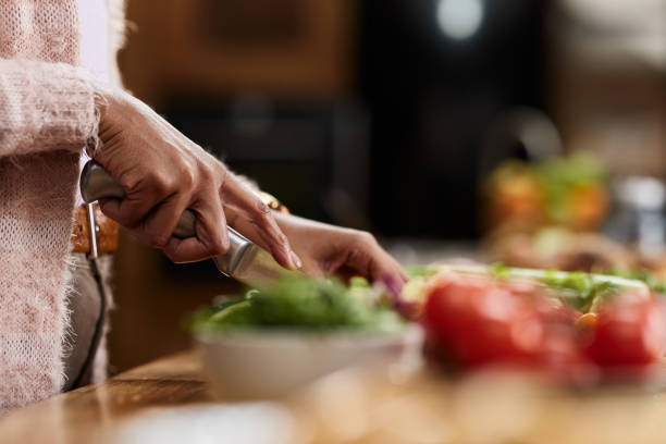 istock Close up of cutting vegetables for lunch. 1397876449