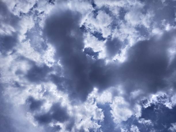 istock Turquoise blue clouds visible in the summer sky 1397879193