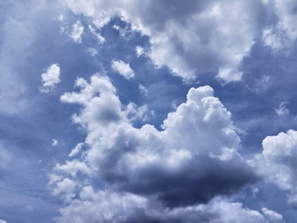 istock Turquoise blue clouds visible in the summer sky 1397879194