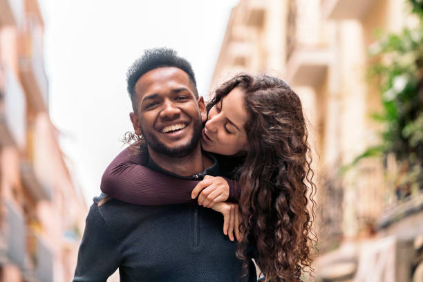 istock Young Multiethnic Couple doing piggyback 1397880619