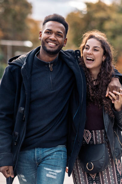 istock Young Happy Interracial Couple Walking 1397880633