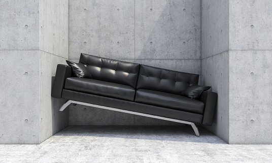 black sofa wedged between two concrete walls. lack of space. 3d render