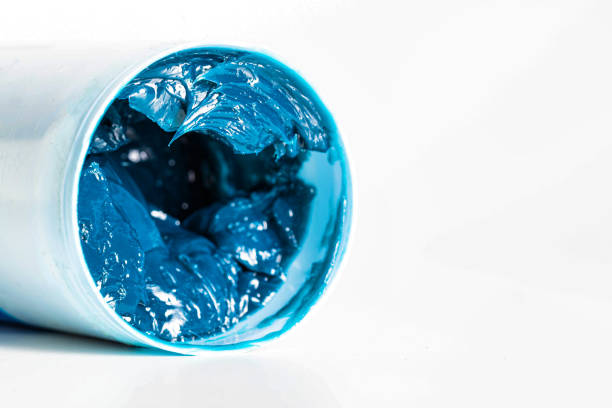 istock Tube with blue automotive high temperature grease on a white background, isolate. Copy space for text, industry 1397884831