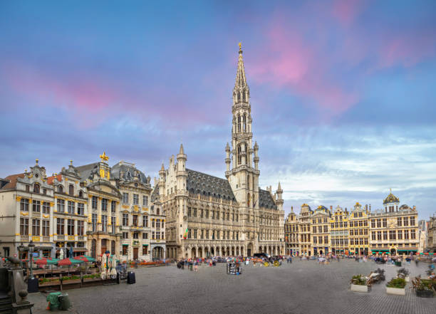 Grand Place in Brussels, Belgium Brussels, Belgium. Panoramic view of Grand Place (Grote Markt) square with gothic City Hall brussels capital region stock pictures, royalty-free photos & images