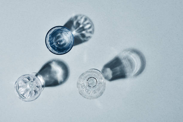 istock Flatlay of three glasses containing transparent pure water on grey background 1397888893