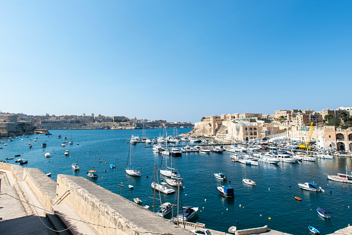 Small boats docked in St George's Bay, Malta