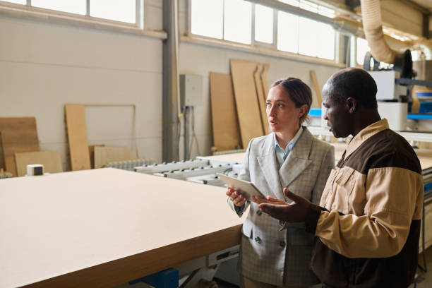 istock Engineers discussing the work of machine 1397893857