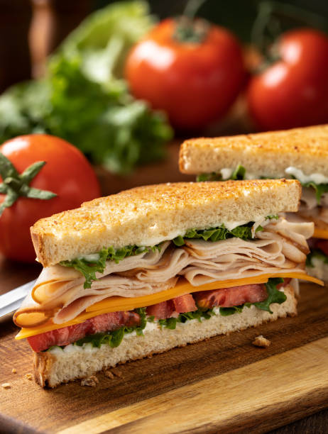 istock Turkey sandwich on toasted bread cut in half 1397894593