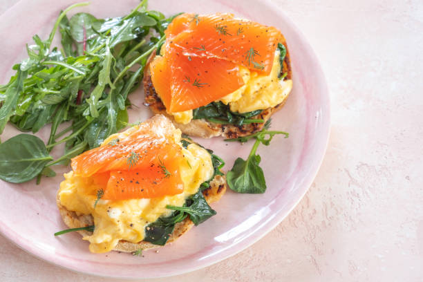 istock Smoked salmon with scrambled eggs on a toasted English muffin. 1397896244