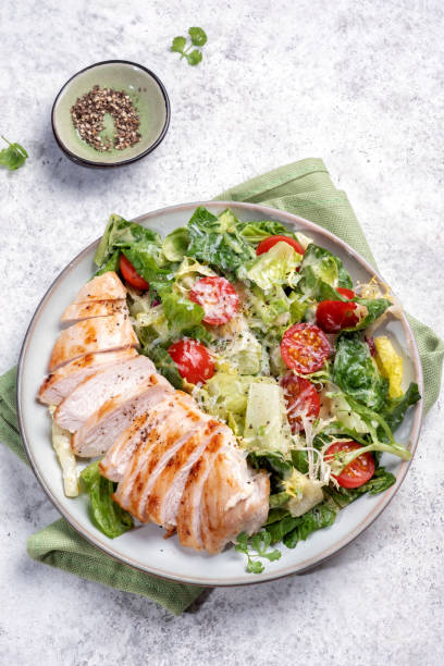 istock Green salad with grilled chicken breast 1397896323