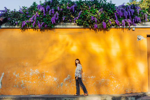 Young Caucasian woman  walking in Antigua, Guatemala