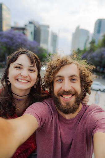 Selfie of young Caucasian  man and woman on the background of Mexico City