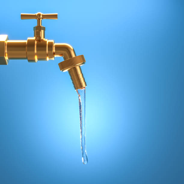 istock gold tap from which water comes out. 1397900461
