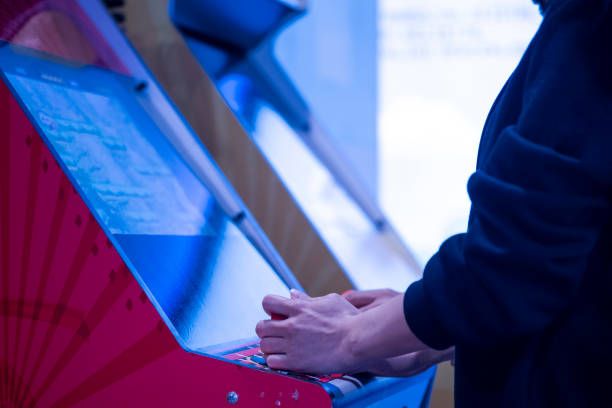 istock Close up shot of person playing with a arcade machine 1397902246