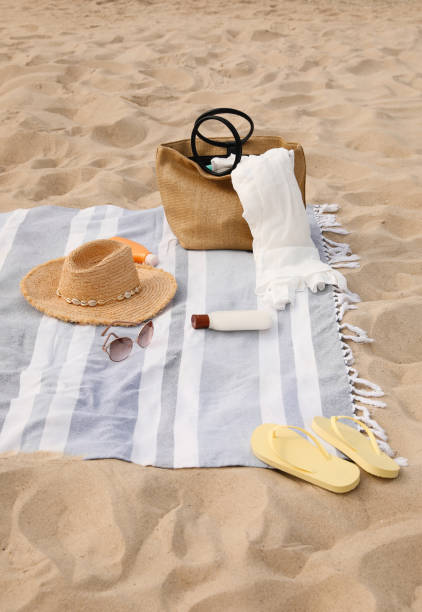istock Bag and other beach items on sand 1397902520