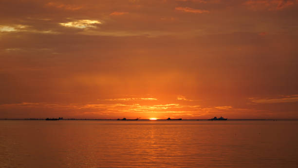 istock sunset in the sea 1397902914