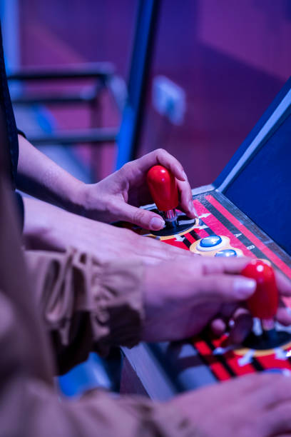 istock Close up shot of person playing with a arcade machine 1397903200