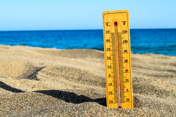 istock Close-up Of Thermometer On Sand Showing High Temperature 1397904668