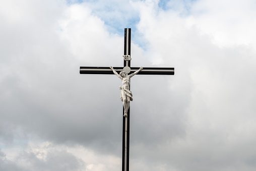 Christian Cross against a cloudy sky