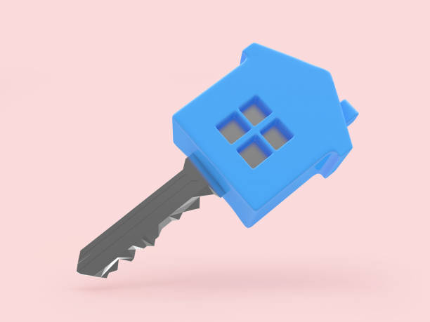 istock Blue house key on pink. 1397906677