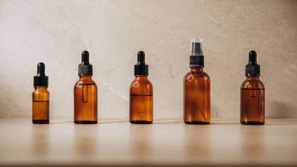 istock Banner, clear bottles with natural SPA cosmetics on a beige stone background 1397911862