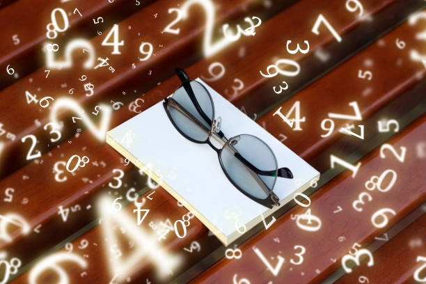 Eyewear on wood table and white background front view detail. Front view low angle. Horizontal composition