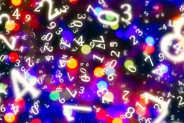 numerology, bokeh of colorful lights close-up surrounded by numbers