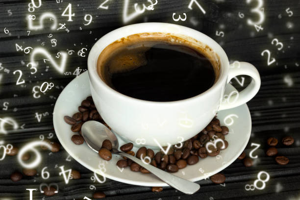 istock numerology, coffee in a white cup surrounded by numbers 1397912526