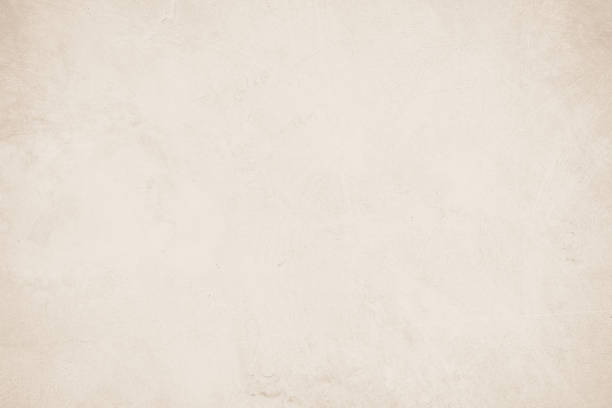 istock Old concrete wall texture background. Close up retro plain beige color cement material surface rough for show or advertise promote product content on display and brown paper design element concept. 1397912733