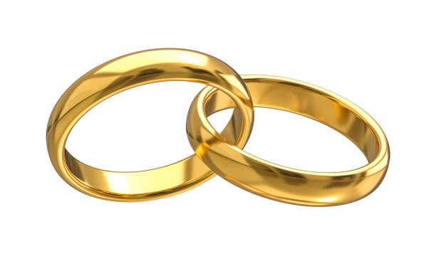 istock golden wedding rings isolated on white. 1397914062
