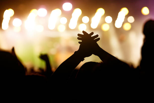 istock Hands that applaud at a concert. 1397914895