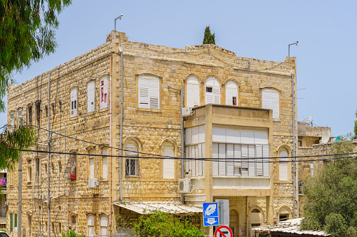 Haifa, Israel - May 13, 2022: View of old buildings, in Hadar HaCarmel Neighborhood, Haifa, Israel