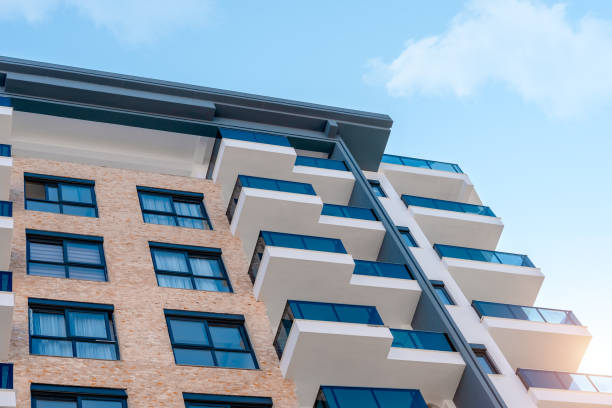modern facade of a residential apartment building. - sunny apartment window sky imagens e fotografias de stock